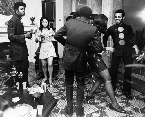 Temptation Dennis Edwards, far left, and cast members party at the Gordy Mansion, April 13, 1970. (Motown Record Corp.)
