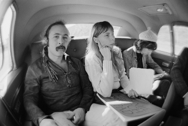 February 1969, California, USA --- Musicians David Crosby (left), Joni Mitchell and Graham Nash travel to Big Bear Lake. --- Image by © Henry Diltz/CORBIS